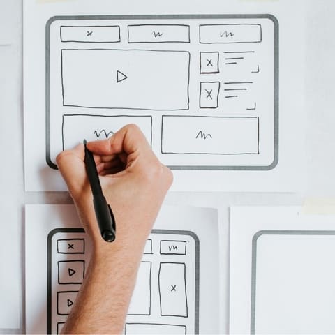 Hand sketching website wireframes for a small business website in Abilene, TX